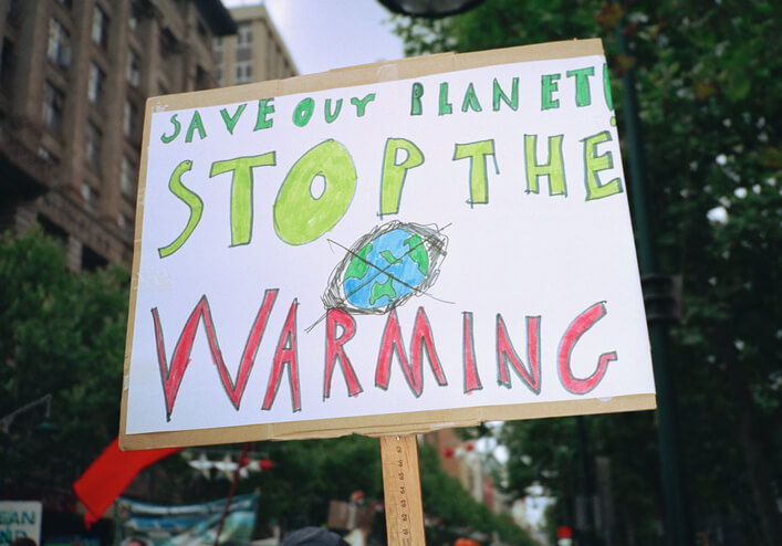 Failed global warming predictions: Global Warming sign that says Save out planet! Stop the warming.