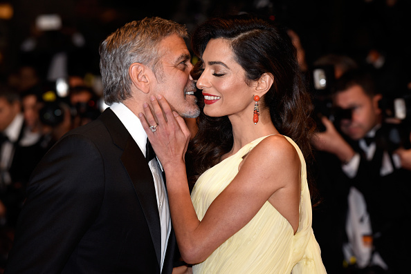 Actor George Clooney and his wife Amal Clooney attend the "Money Monster" premiere during the 69th annual Cannes Film Festival at the Palais des Festivals on May 12, 2016 in Cannes, France.