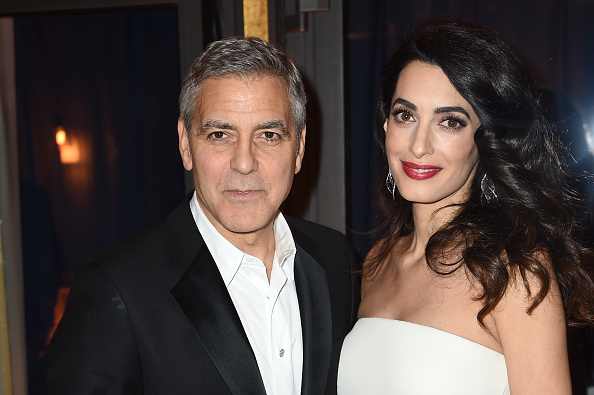 George Clooney and Amal Clooney attend the Cesar Dinner at Le Fouquet's on February 24, 2017 in Paris, France.