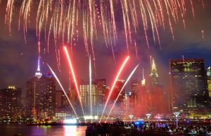 The Empire State Building and the Christal Building during the Macy's 4th of July fireworks show from Queens, New York on July 4, 2017.
