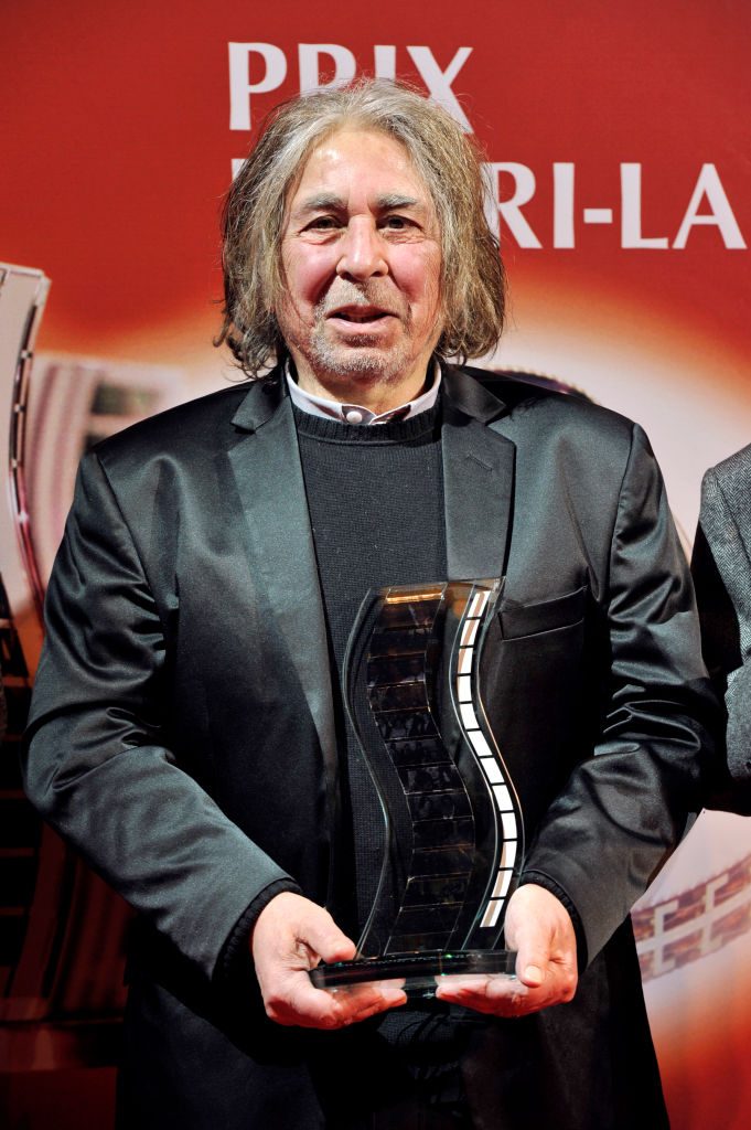French composer and musician Francis Lai poses after receiving an Henri Langlois film award on January 31, 2011 in Vincennes, east of Paris.
