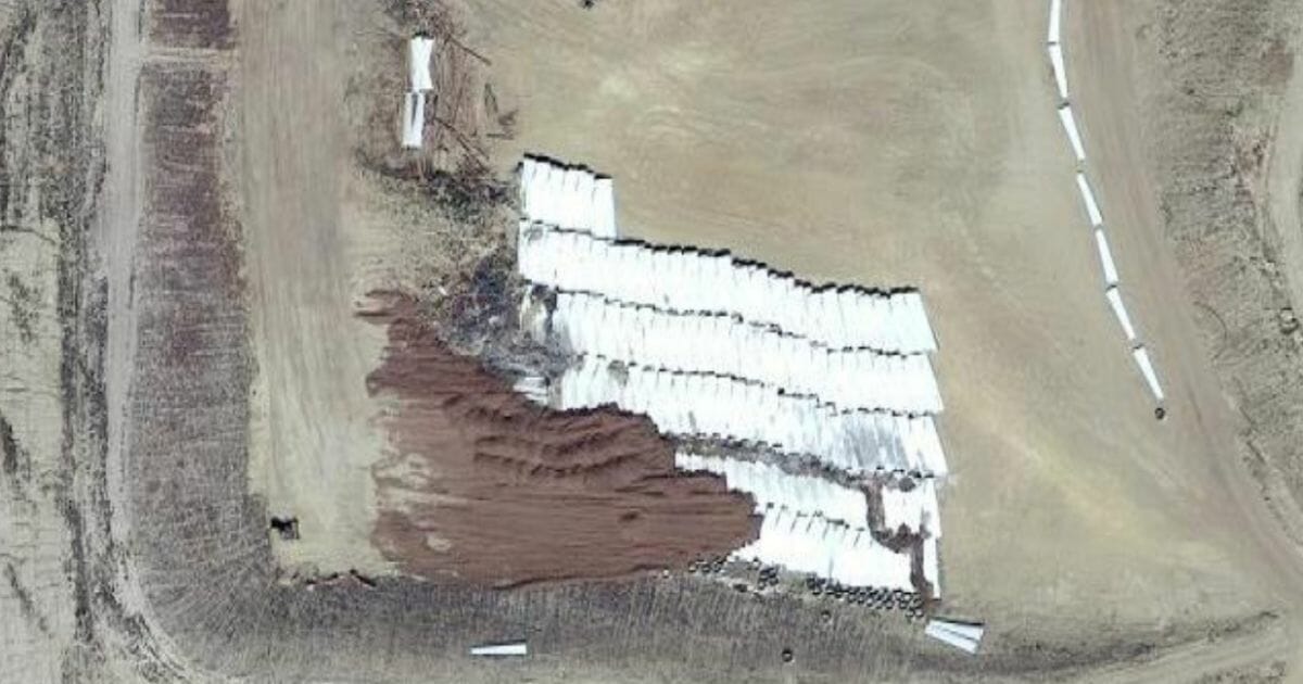 Viewing the landfill on Google Maps reveals rows and rows of the fiberglass blades, only partially covered with dirt.