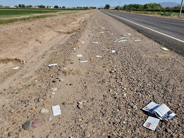 Mail litters the side of Beloat Road in Maricopa County, Arizona, near Buckeye on Oct. 13, 2019. (Courtesy of Bill Kerr)